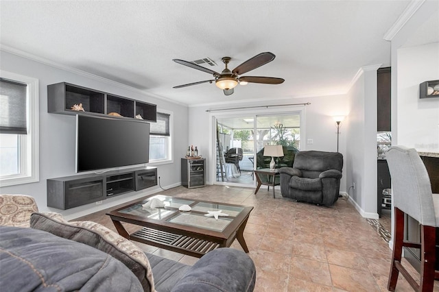 living room featuring a textured ceiling, ceiling fan, crown molding, and light tile patterned flooring