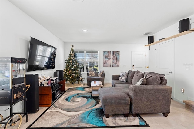 living room with light tile patterned floors