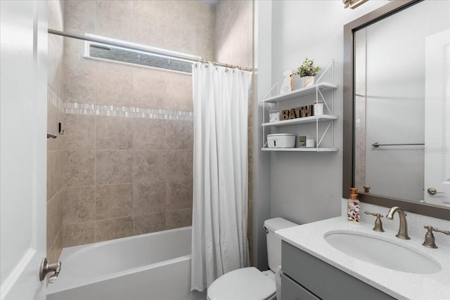 full bathroom featuring vanity, toilet, and shower / bathtub combination with curtain