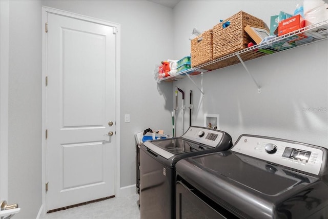 laundry area featuring separate washer and dryer