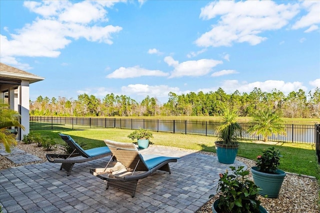 view of patio featuring a water view