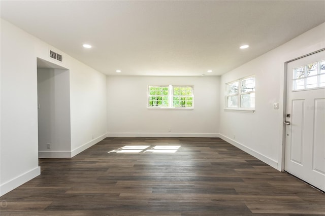 entryway with dark wood-type flooring