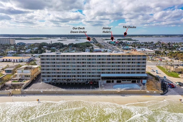 bird's eye view with a view of the beach and a water view