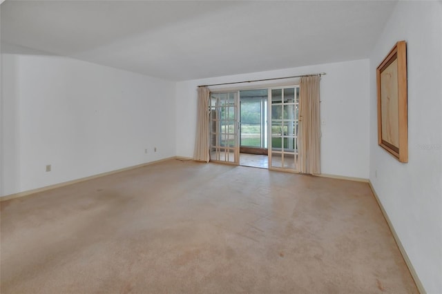 view of carpeted spare room