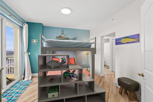 bedroom with wood-type flooring