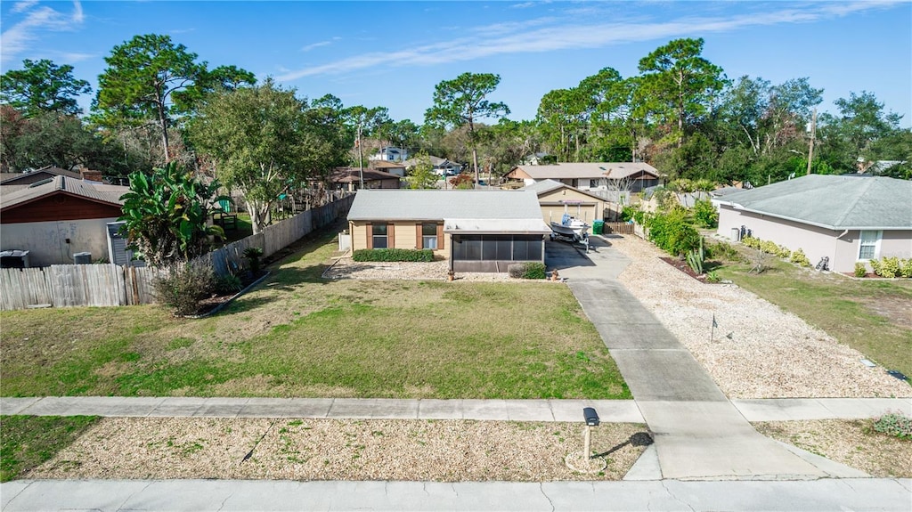 view of front facade featuring a front yard