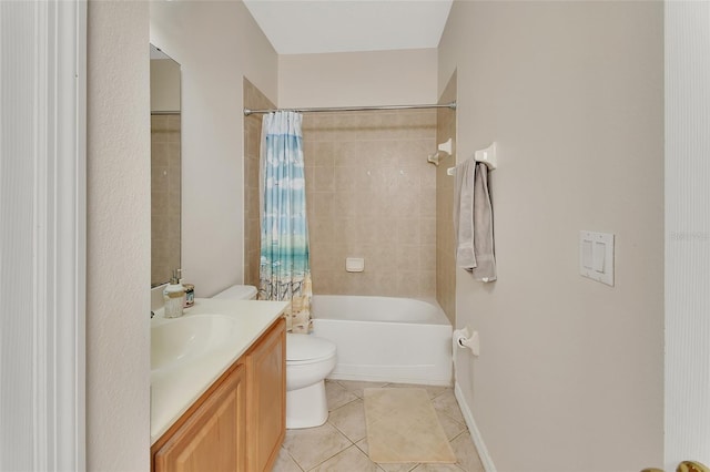 full bathroom with tile patterned floors, vanity, toilet, and shower / bath combo with shower curtain