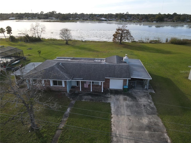 drone / aerial view featuring a water view