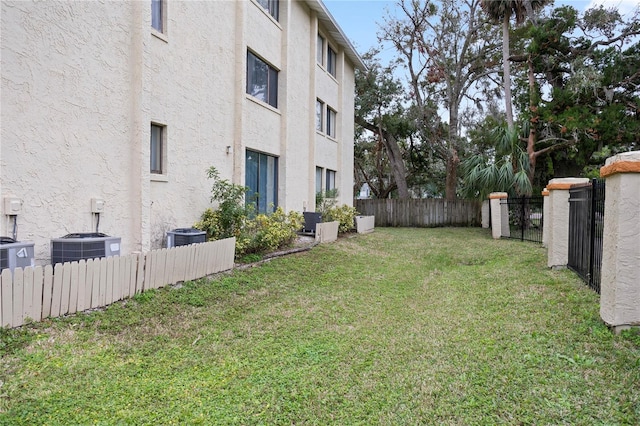 view of yard with central AC