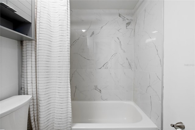 bathroom featuring shower / bathtub combination with curtain and toilet