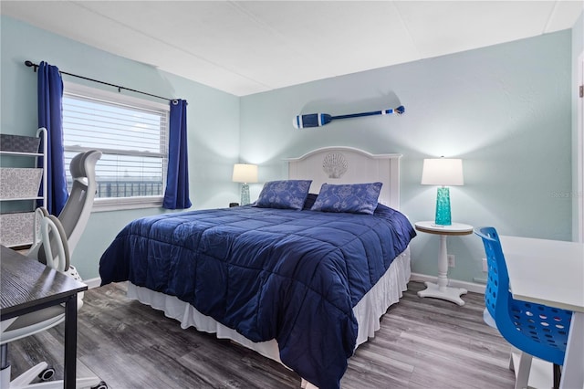 bedroom featuring wood-type flooring