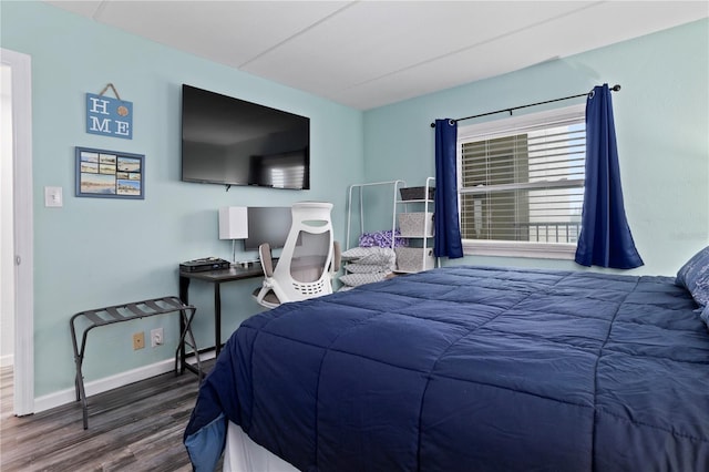 bedroom featuring dark wood-type flooring