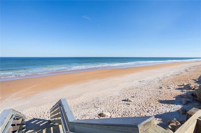 view of water feature with a beach view