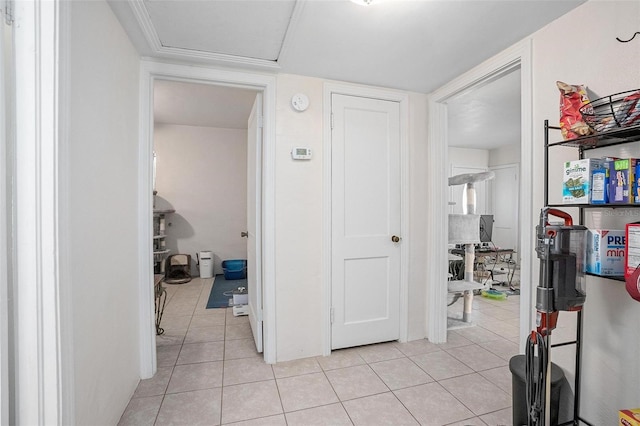 hallway with light tile patterned flooring