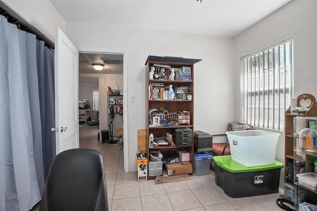 office with light tile patterned floors