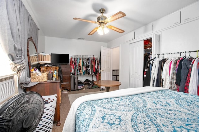 carpeted bedroom with a closet and ceiling fan