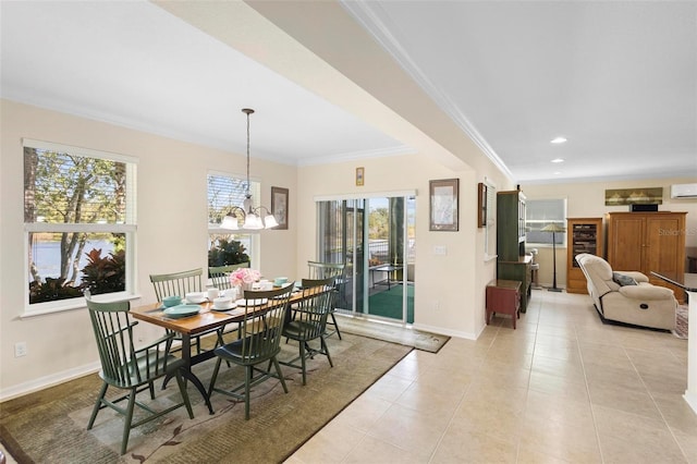 tiled dining room featuring crown molding and a notable chandelier