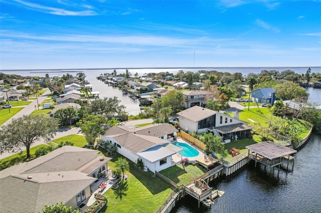 bird's eye view with a water view