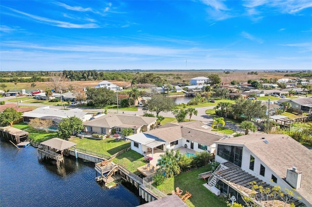 drone / aerial view featuring a water view