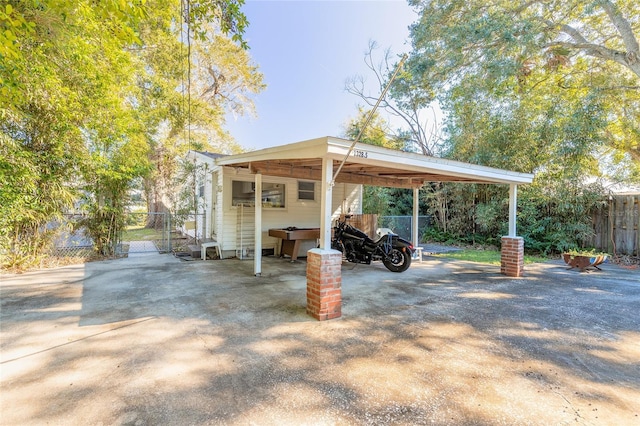 view of car parking with a carport