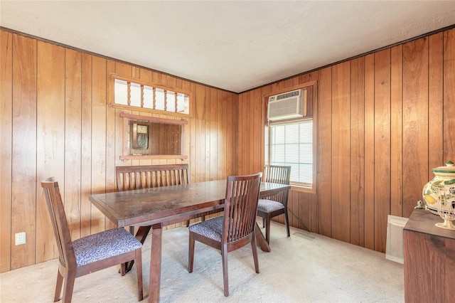 carpeted dining area with a wall mounted air conditioner and wooden walls