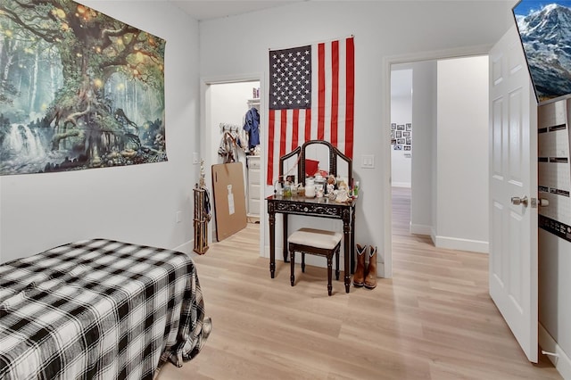 bedroom featuring light wood-type flooring