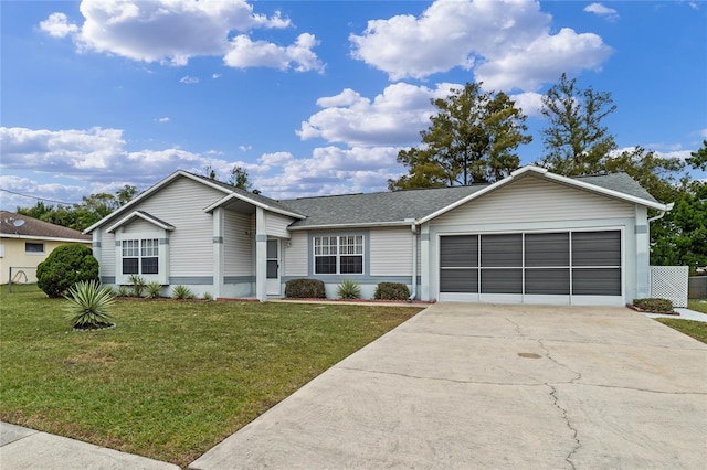 single story home with a garage and a front lawn