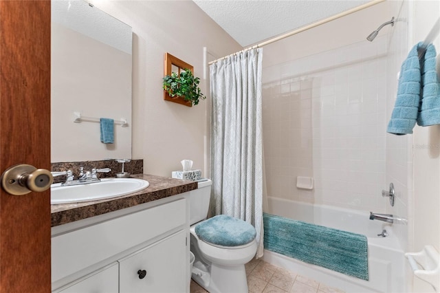 full bathroom with tile patterned floors, toilet, a textured ceiling, vanity, and shower / bath combo with shower curtain