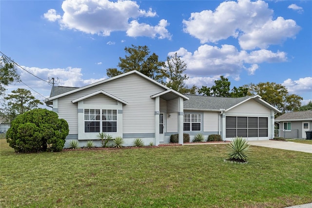 view of front of house featuring a garage and a front yard