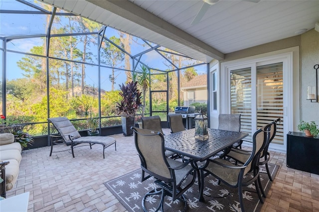 view of patio / terrace featuring a lanai