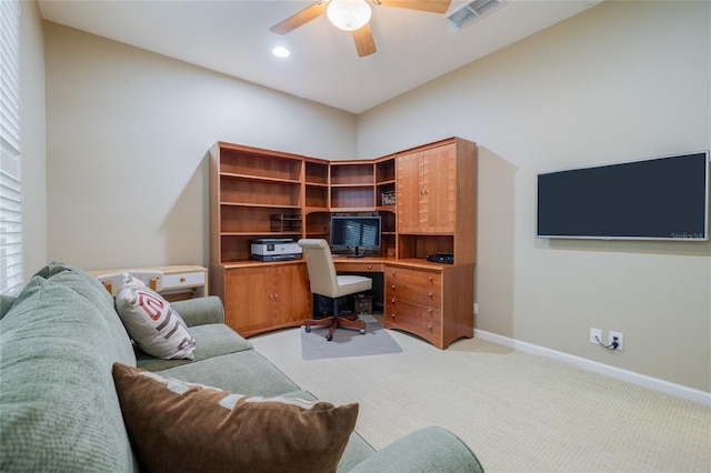 office area with ceiling fan and light colored carpet