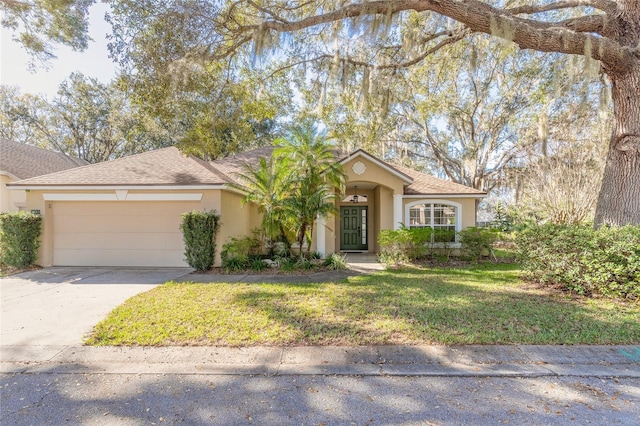 view of front of home featuring a garage and a front lawn