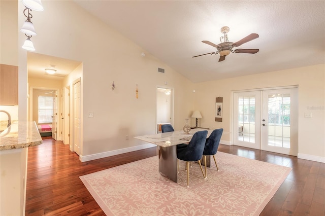 dining room with ceiling fan, dark hardwood / wood-style flooring, french doors, and a wealth of natural light