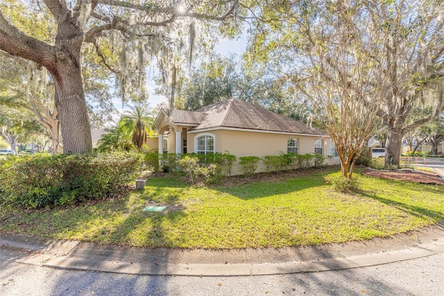 view of front of home with a front yard