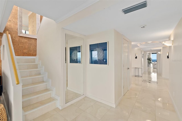 hallway with light tile patterned floors