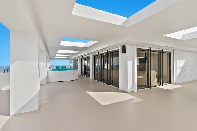 hallway with a skylight