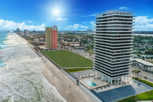 aerial view featuring a beach view and a water view