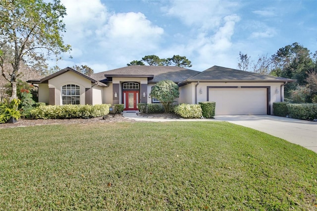 single story home featuring a garage and a front lawn