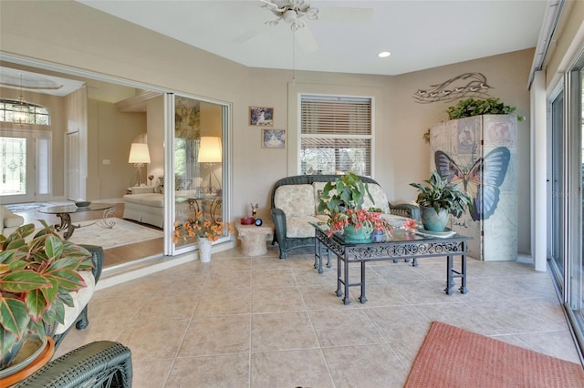 sunroom / solarium with ceiling fan