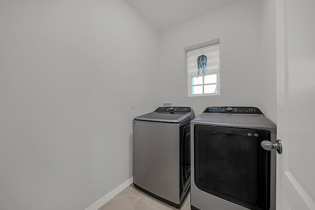 washroom featuring separate washer and dryer