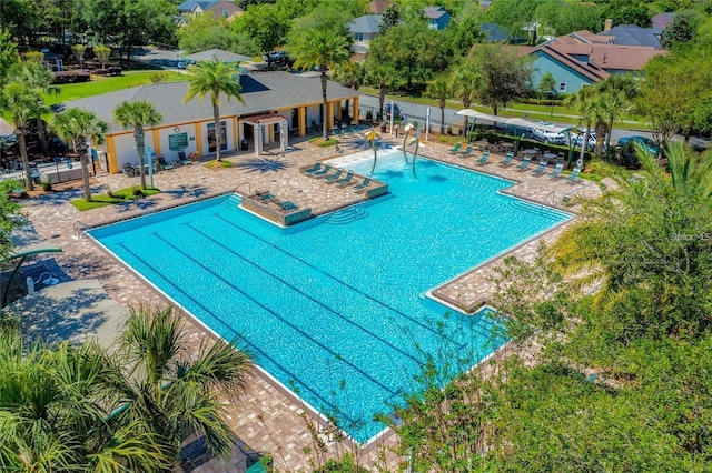 view of swimming pool featuring a patio area