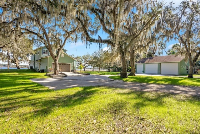 view of yard featuring a garage