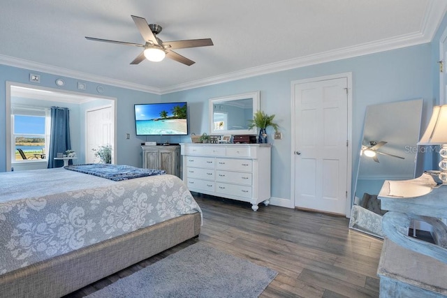 bedroom featuring dark hardwood / wood-style floors, ceiling fan, and ornamental molding