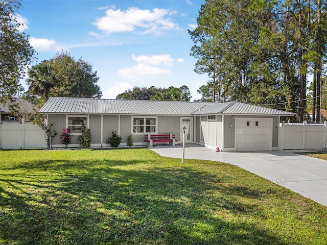 ranch-style home with a garage and a front yard