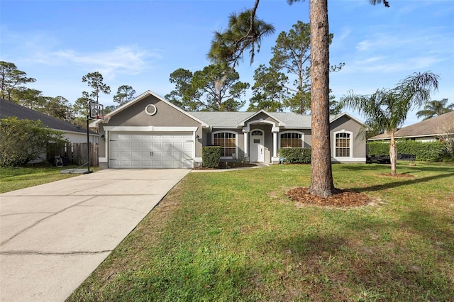 single story home featuring a garage and a front lawn