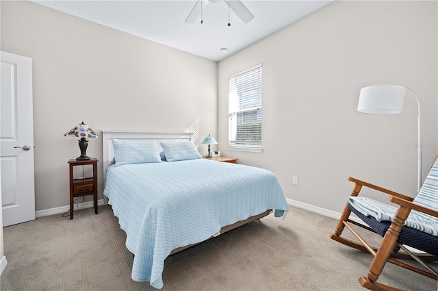 bedroom with ceiling fan and light colored carpet