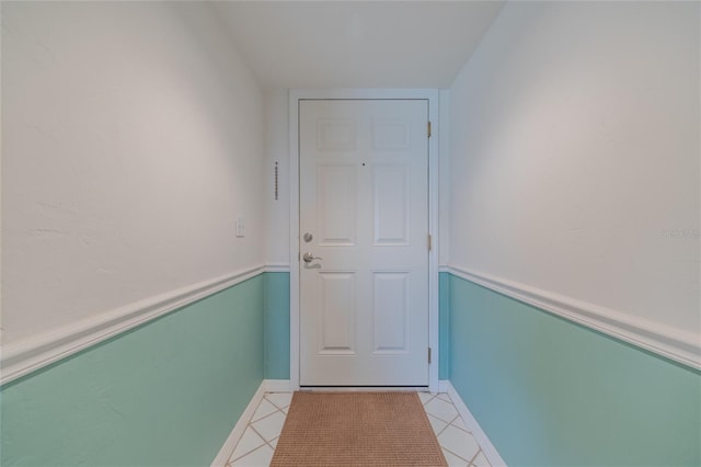 entryway featuring light tile patterned flooring