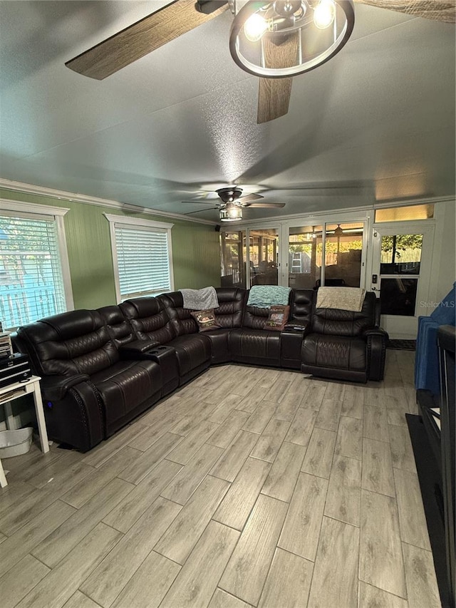 living room featuring crown molding