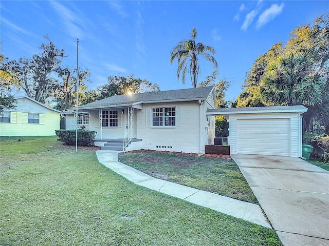 single story home with a front yard, a porch, and a garage