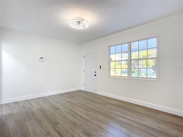 empty room featuring dark hardwood / wood-style floors